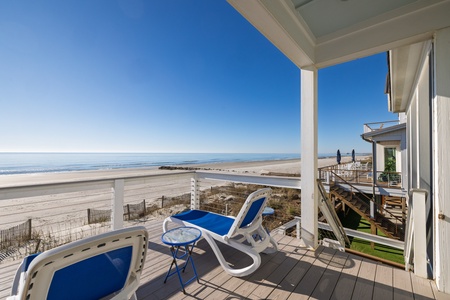 Enjoy panoramic ocean views from your comfortable outdoor loungers