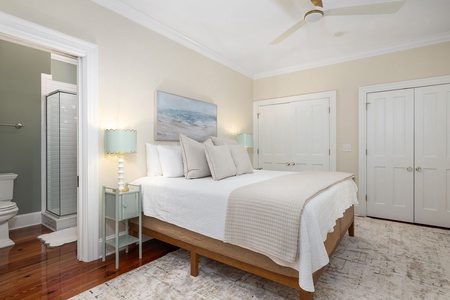 Pass through french doors to your third king bedroom with en suite bathroom