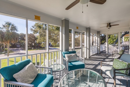 Relax on your screened-in porch with morning coffee or evening drinks