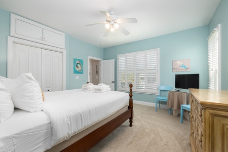 Drift off in your second downstairs queen bedroom
