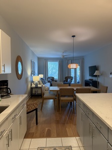 Your spacious open-concept living flows seamlessly from kitchen to dining to living room, perfect for gathering and relaxation.