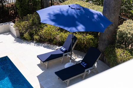 Soak up the sun in your poolside lounge chairs