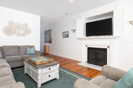 Your living room flows seamlessly between the kitchen and dining room