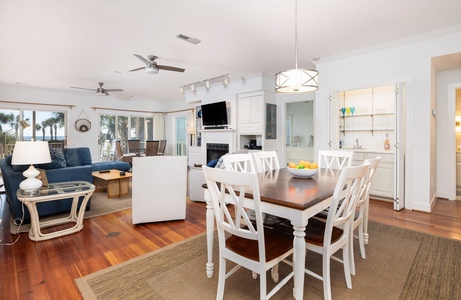 The dining room flows directly into your large, coastal living room