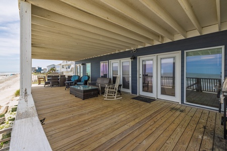 Your covered wrap-around deck is spacious and the perfect place to host