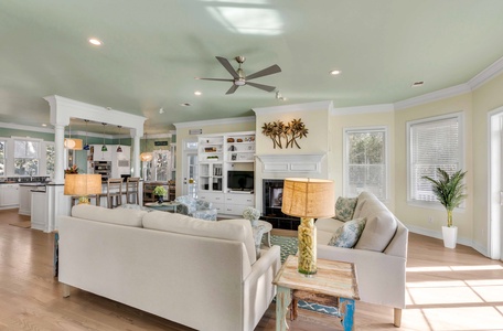 Your living room flows seamlessly between the kitchen and dining room