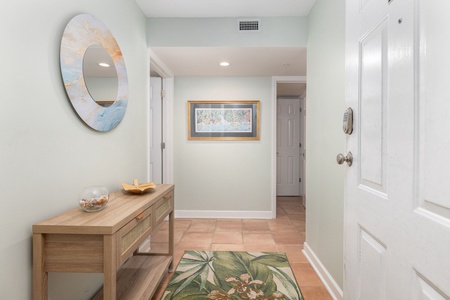Your welcoming entryway greets you with coastal charm and thoughtful details for the perfect beach getaway arrival.