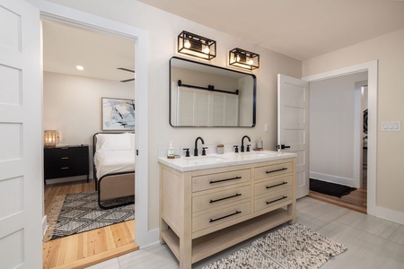 Bath with access from first queen bedroom and the hall