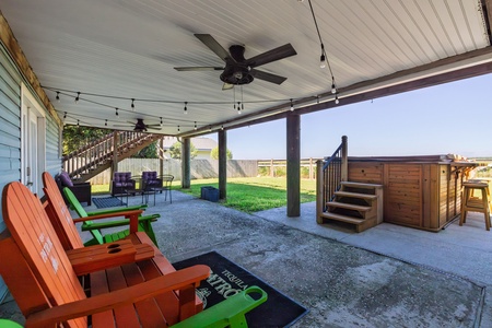 Outdoor living hits different at On Beach Time, thanks to a spacious jacuzzi and a covered patio