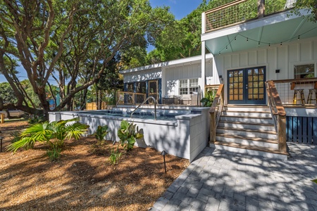 The steps from your deck take you to your beautiful landscaped yard