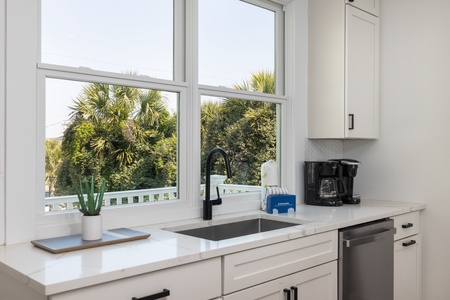 Enjoy the view with these large windows above your kitchen sink