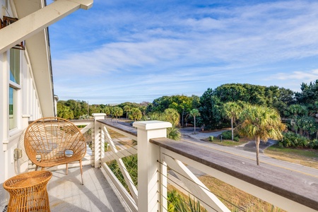 Top Floor Balcony Overlooking Palm Blvd