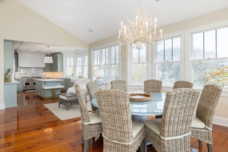 Just off the living room is your dining space featuring a large 8-seater dining table