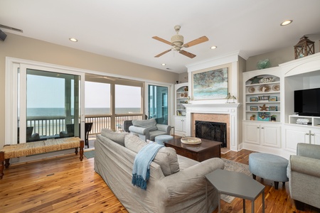 Your upstairs living room is the perfect place to unwind after a day on the beach