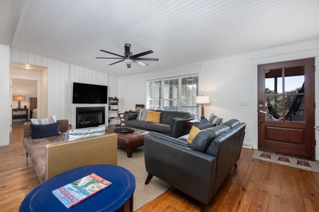 Your bright living room features plush seating and coastal charm