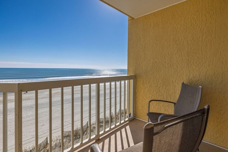 Relax on your private balcony while the waves roll in.