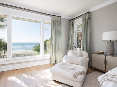 Sink into your plush chaise lounge while taking in the ocean views
