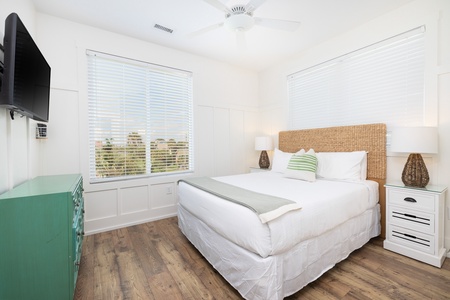 Your second upstairs queen bedroom is a cozy spot to relax after a day at the beach
