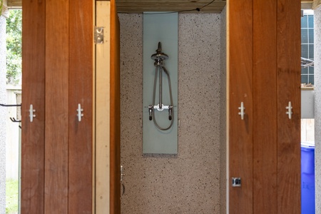 A full outdoor shower is available on your covered patio