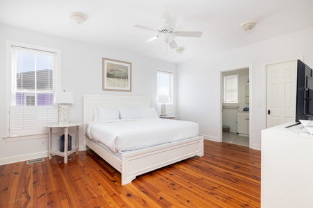 Your upstairs primary bedroom features two en suite bathrooms