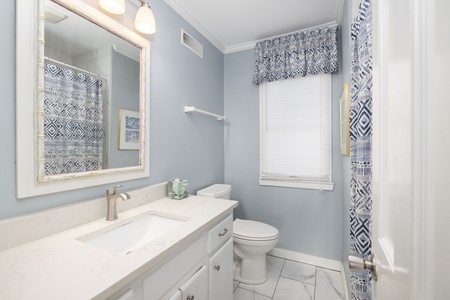 First floor hall bath with tub/shower combo
