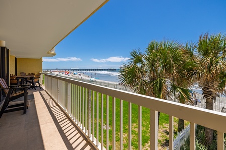 Take in the sweeping views of the shoreline from your beachfront balcony