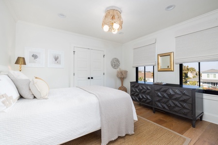 Your second king bedroom has an en suite bathroom and plenty of natural light