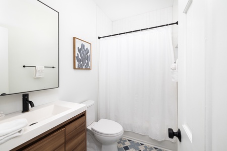 Your second bathroom offers a tub-shower combo