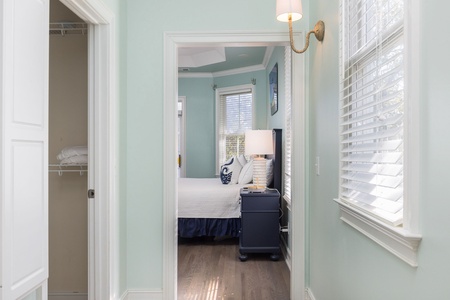 Pass through the hallway to your upstairs primary bathroom