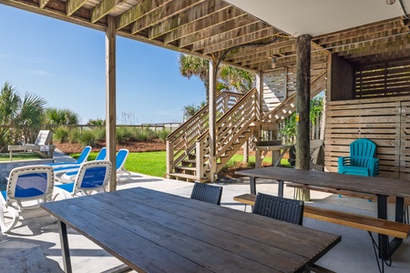 Hang out on the covered porch overlooking the pool area