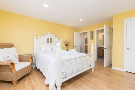 Your bright and cheery bedroom features a full size bed and en suite bathroom