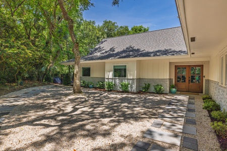 Take the path from the driveway to your front door