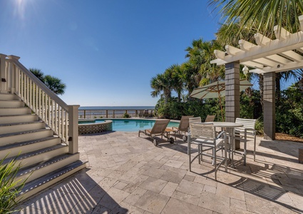 A sparklingly clean pool is ready for summer afternoons under the sun