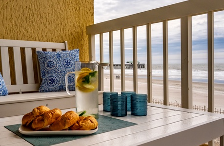 Sip your morning coffee on your private balcony while watching waves roll onto pristine sand below.
