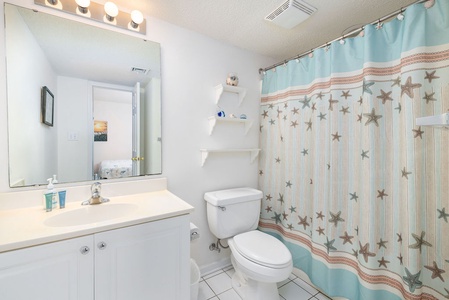 Freshen up in your cheerful private ensuite bath with access from the queen bedroom.