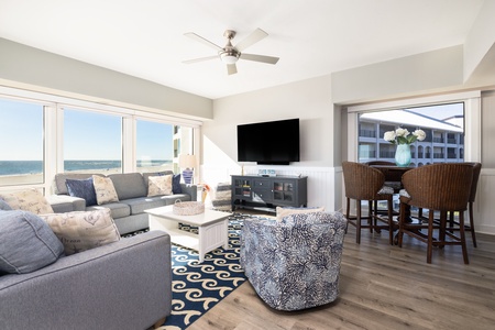 Sink into comfortable seating with views of the ocean beyond