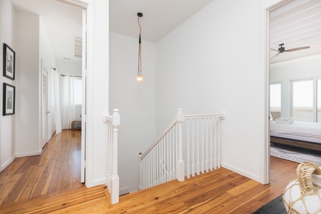 Take the steps to your upstairs landing