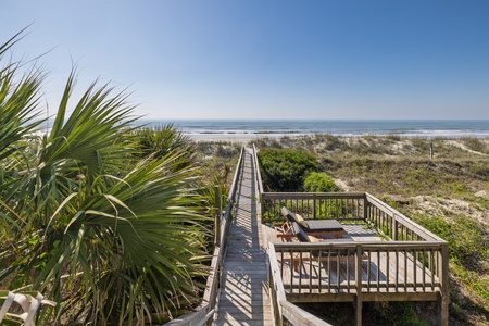 Take the private boardwalk out to the beach