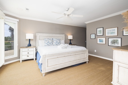 Your primary bedroom features a king size bed and en suite bathroom