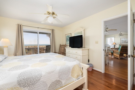 Your first floor primary bedroom features a comfortable king bed