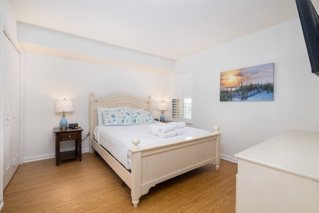 Your queen bedroom is a quiet coastal retreat