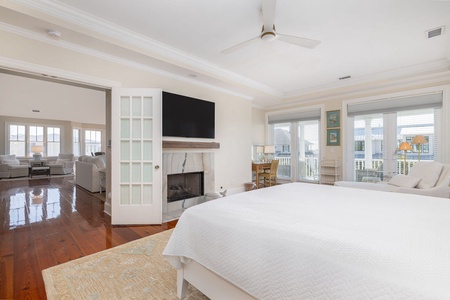 Your primary bedroom includes a comfy king bed, fireplace, and private balcony