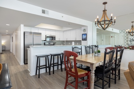 Cook up beachside feasts in a fully equipped kitchen — granite countertops, stainless-steel appliances, and open dining make Sand Fort perfect for families or group getaways