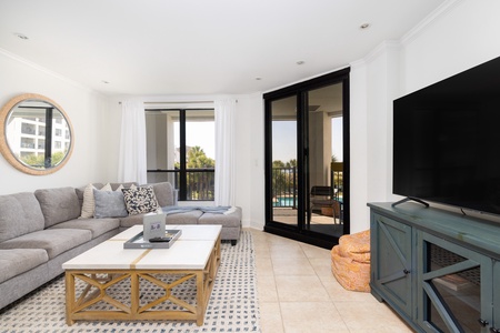 Pass through the living room to get to your private balcony