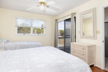 Your queen and twin bedroom has private access to the balcony