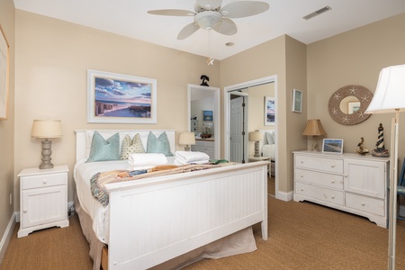 The primary bedroom features a queen bed and en suite bathroom
