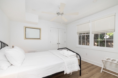 Your second downstairs queen features an en suite bathroom