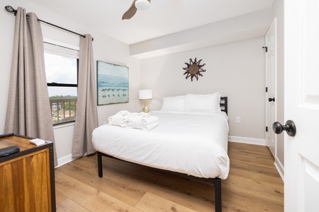 The queen bedroom features an en suite bathroom