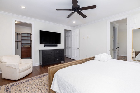 Your primary bedroom features a plush king bed.