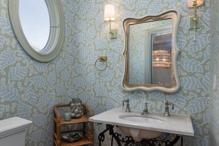 On your main floor you'll find a relaxing half bathroom with single vanity